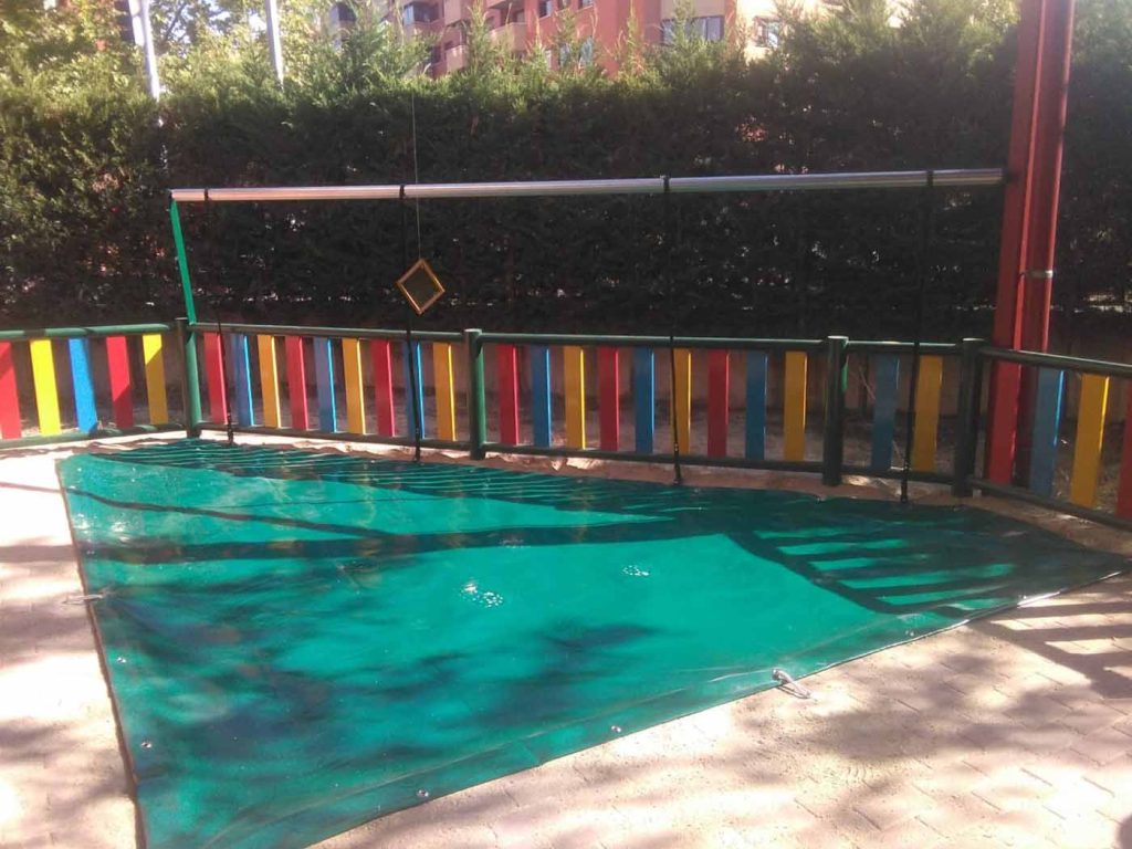 cobertores areneros parques infantiles